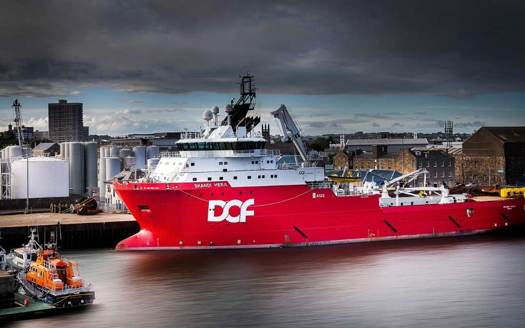 Marine vessel "Skandi Hera" docked at a port, showcasing maritime industry and commercial applications in marine photography.