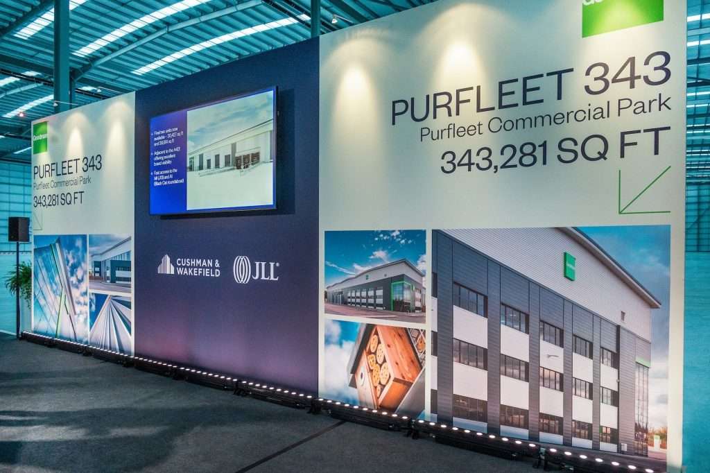 Purfleet Commercial Park display showcasing "Purfleet 343" with 343,281 sq ft, featuring logos of Cushman & Wakefield and JLL, in an industrial setting.