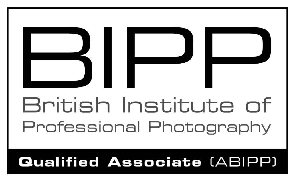BIPP logo featuring "British Institute of Professional Photography" and "Qualified Associate (ABIPP)" designation, representing professional photography standards and Duncan MacBrayne's credentials.